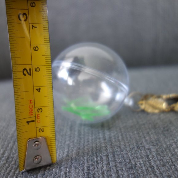 Broken Uranium Glass Inside Plastic Ornament with Metal Necklace - Picture 10 of 10